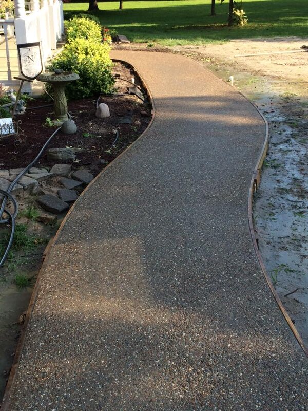 Exposed aggregate concrete to replace stamped concrete